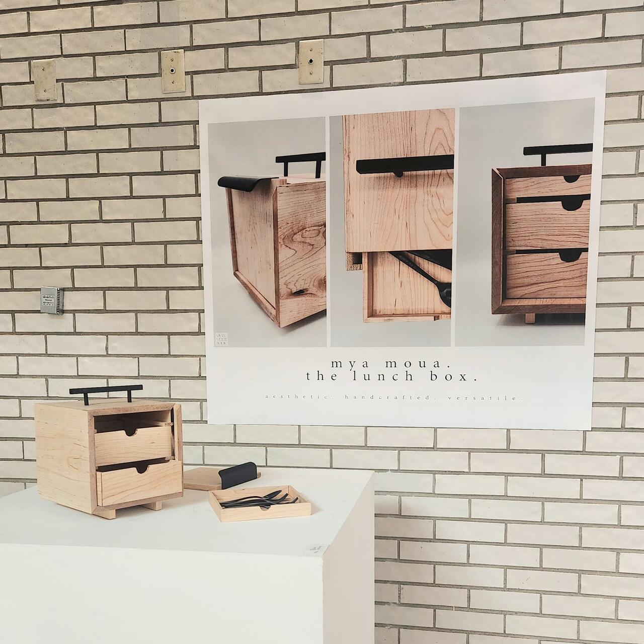 Mya Moua's merit setup, featuring a handmade wooden drawer set