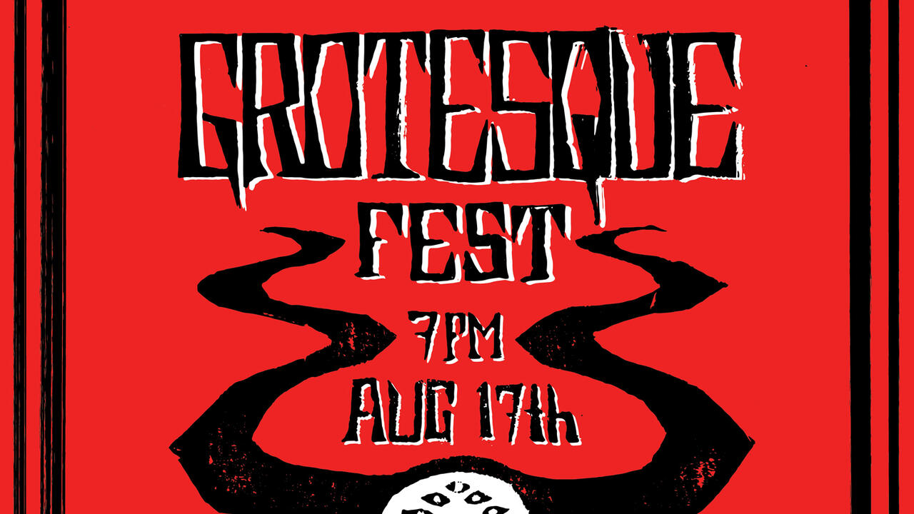 A banner for "Grotesque Fest" it has a large creature with six eyes and two large portruding horns. The creature is fully black. The background is red
