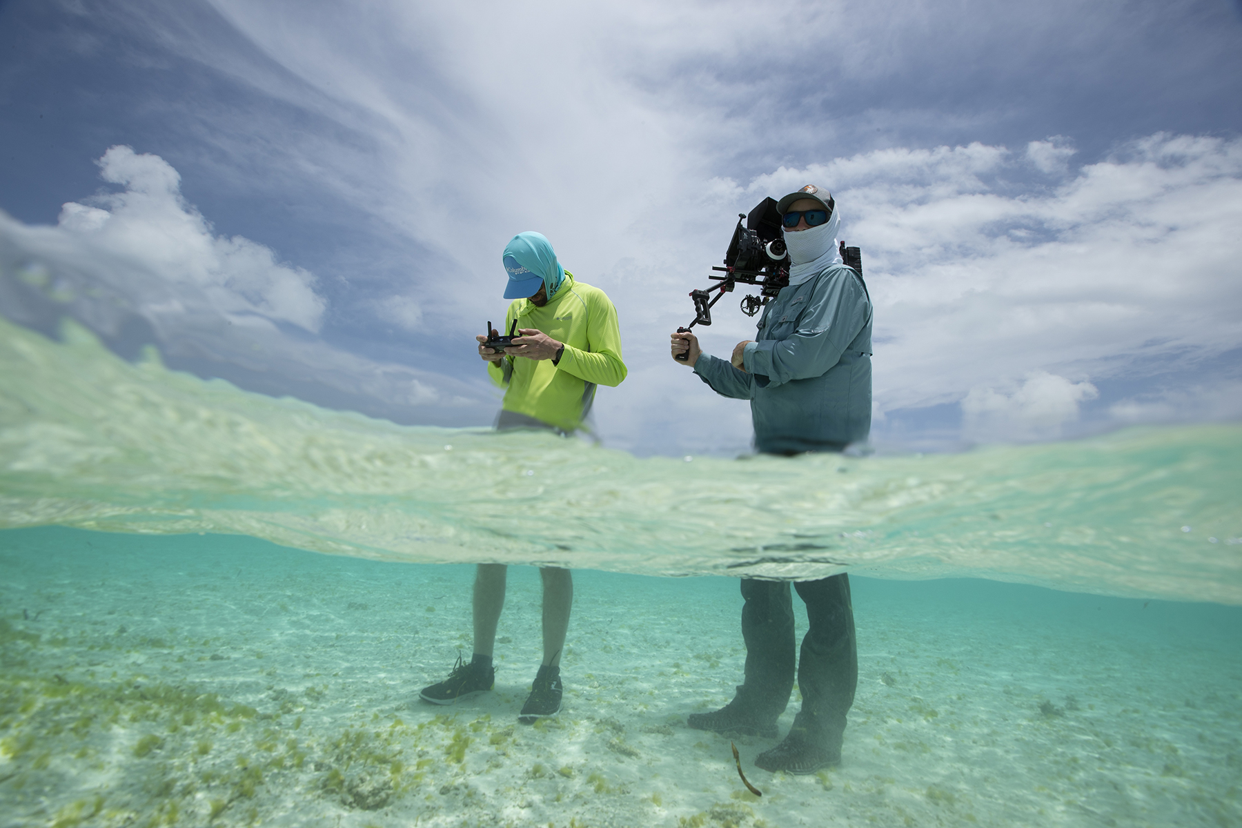 Joshua VP photographing in the sea.