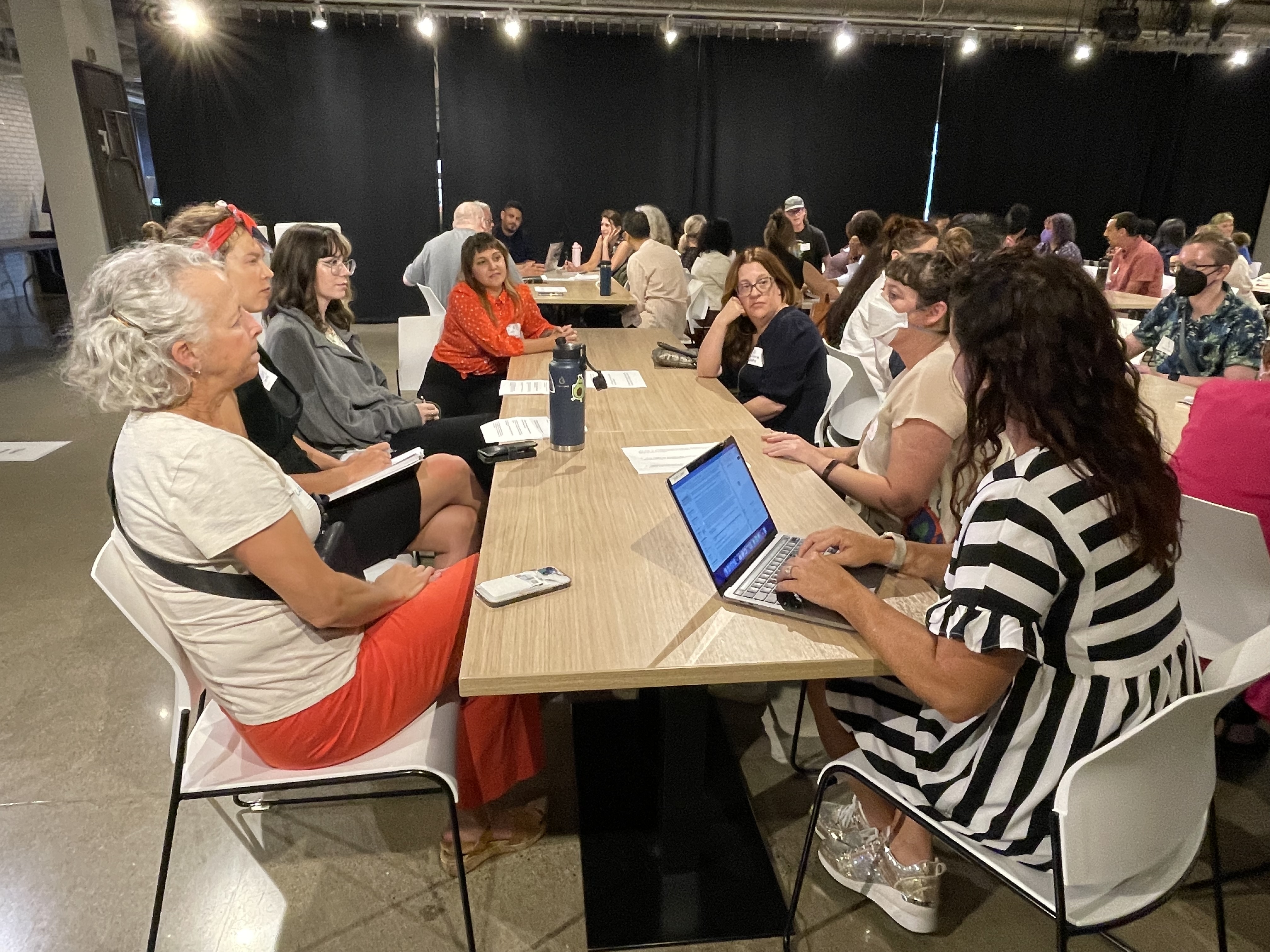 MCAD creative leaders sitting around a table