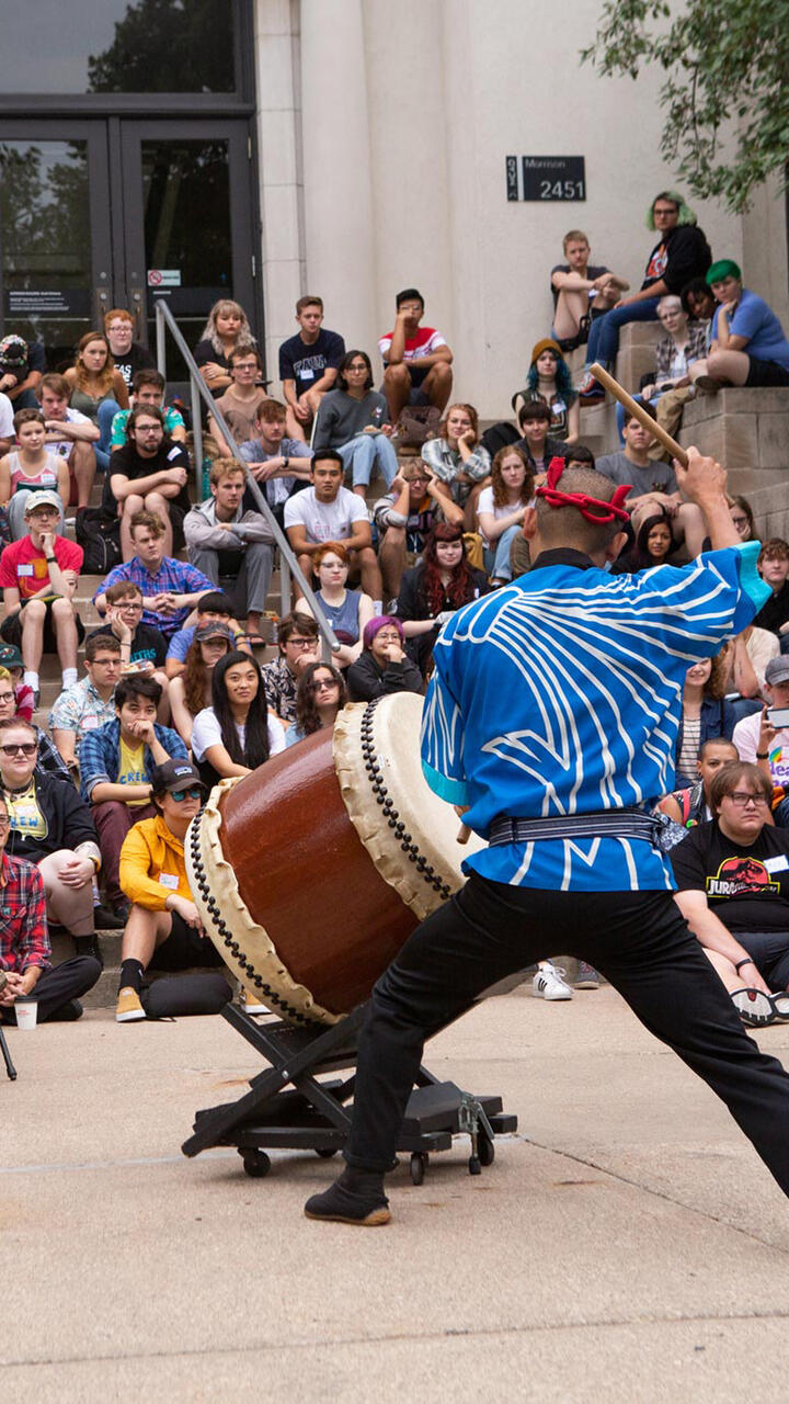 Incoming students gathered on Morrison steps to watch a musical performance during orientation.