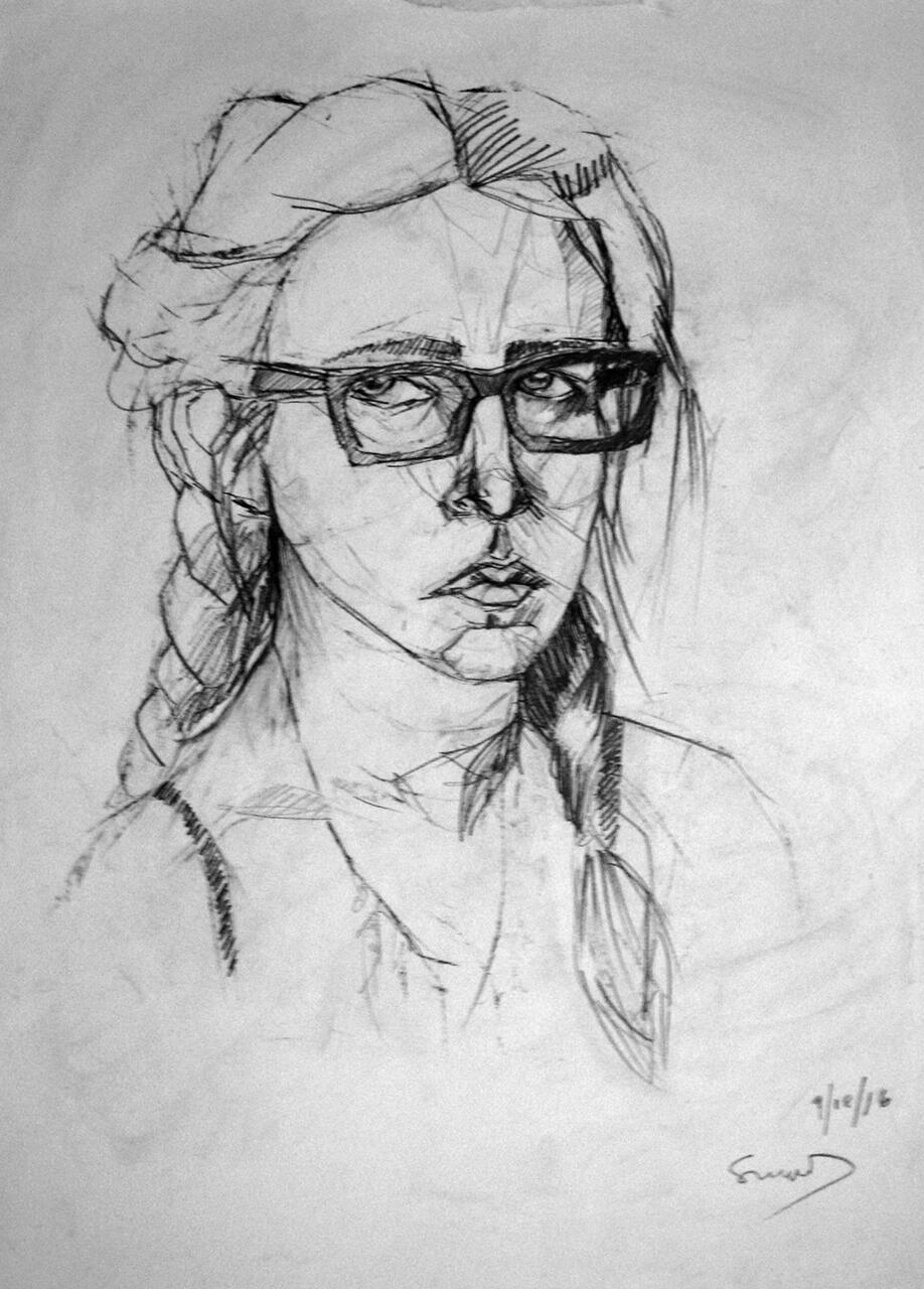 Charcoal self portrait drawing of artist, using construction lines.