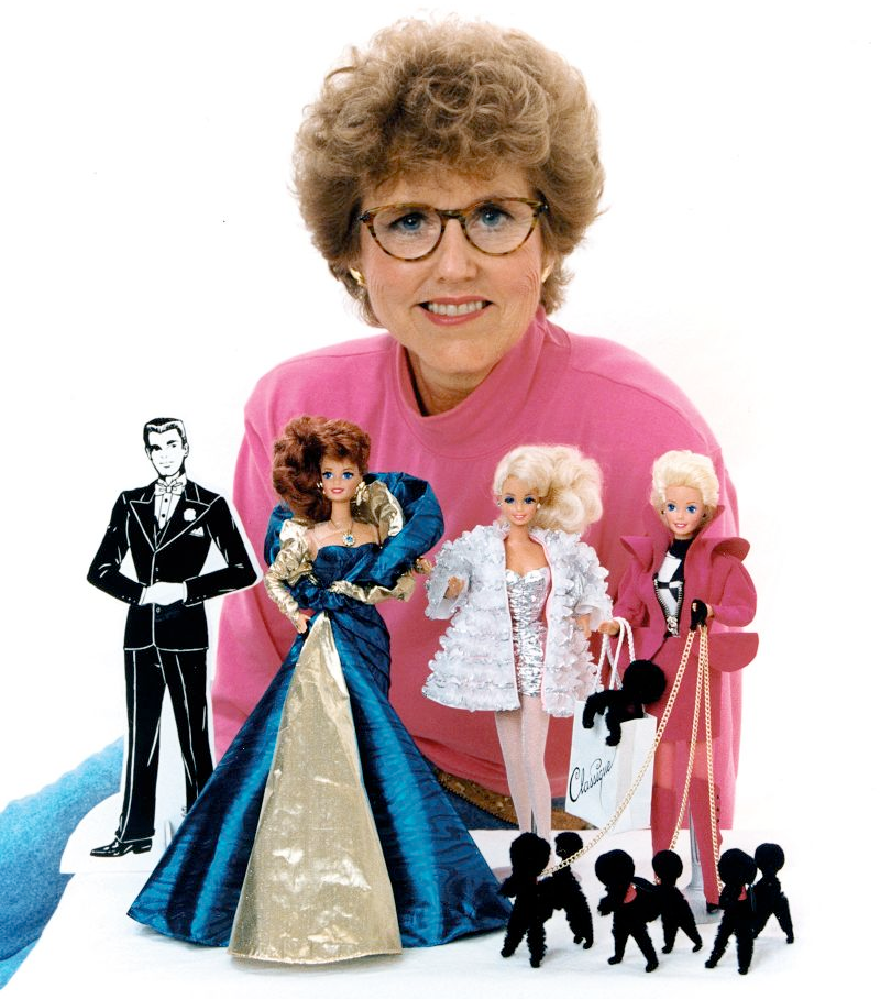 An image of Barbie fashion designer Carol Spencer, along with a few Barbie dolls/accessories.
