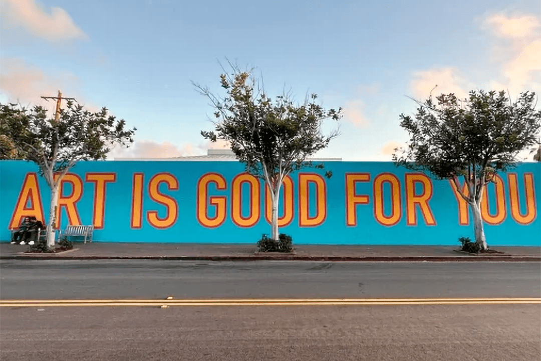 A mural that reads "ART IS GOOD FOR YOU".