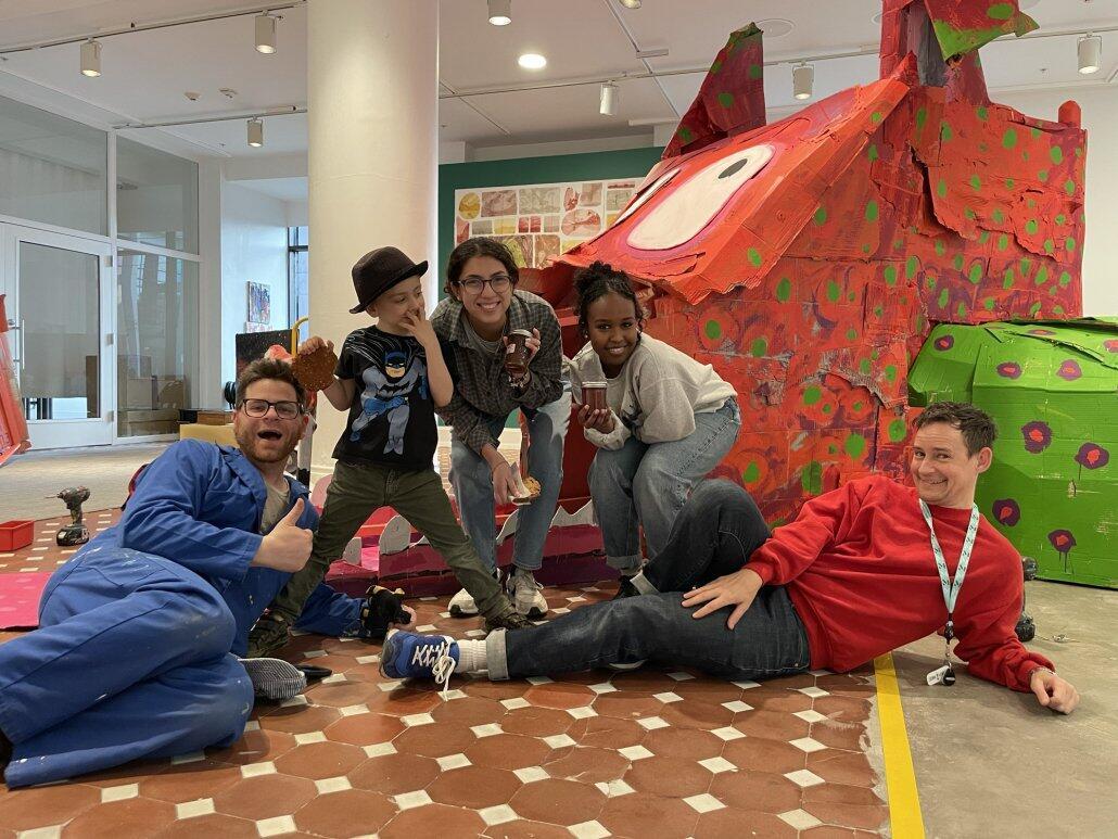 Artist Emmett Ramstad poses with several people involved in his exhibition TOGETHER.