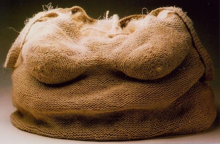 Karen Searle, Body Bag III: Tote, 1999, knit linen, flax fiber, and rope, 28 in. x 16 in. x 16 in.